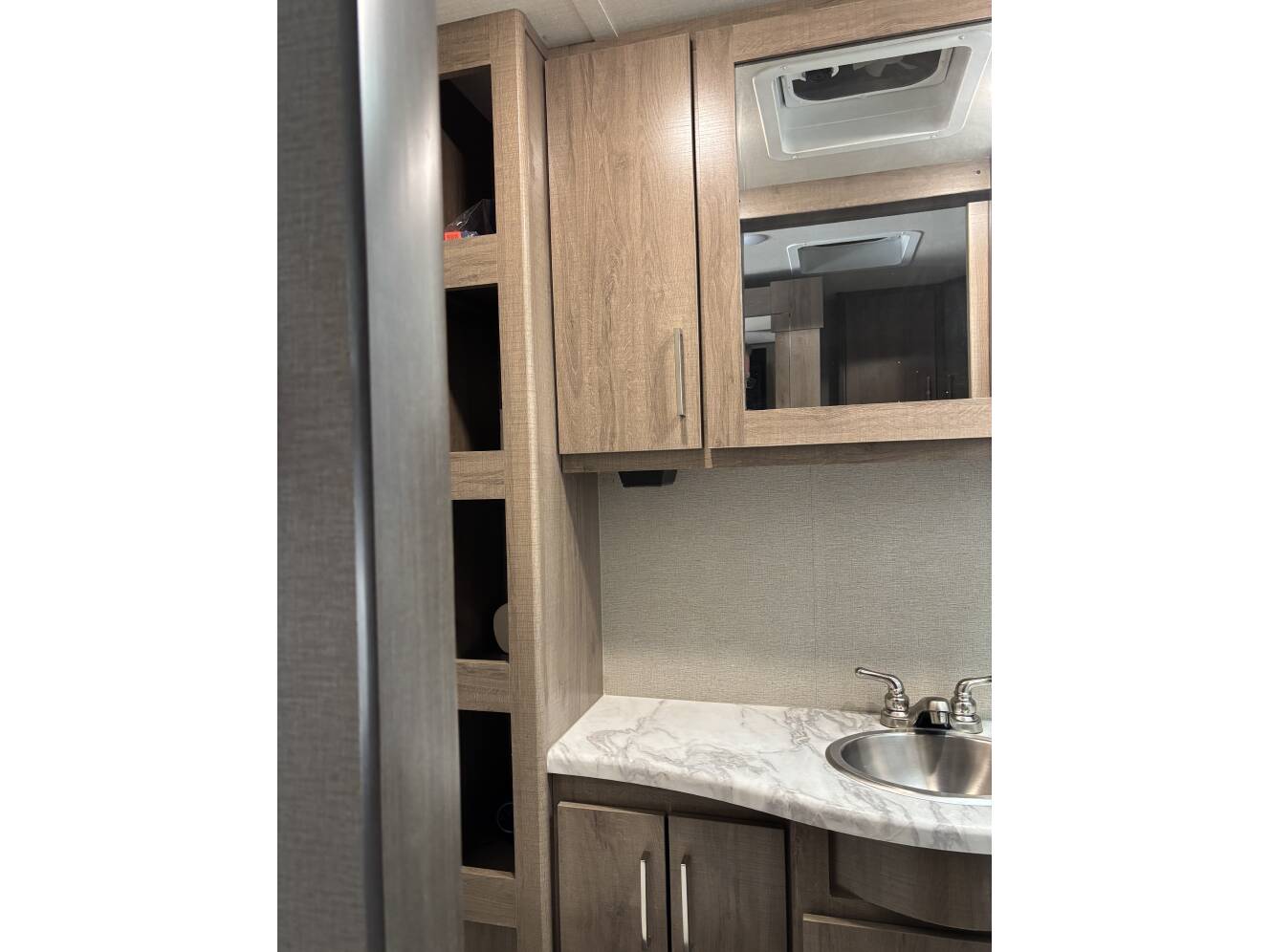 A photo of this 2022 Grand Design IMAGINE XLS 22MLE