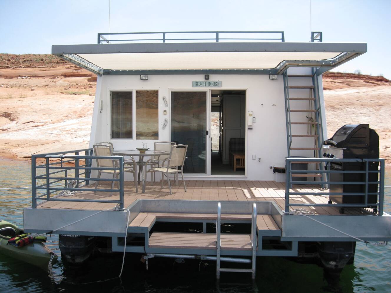 A photo of this 2004 Custom Houseboat