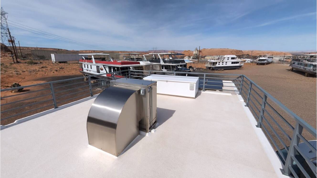 A photo of this 2004 Custom Houseboat