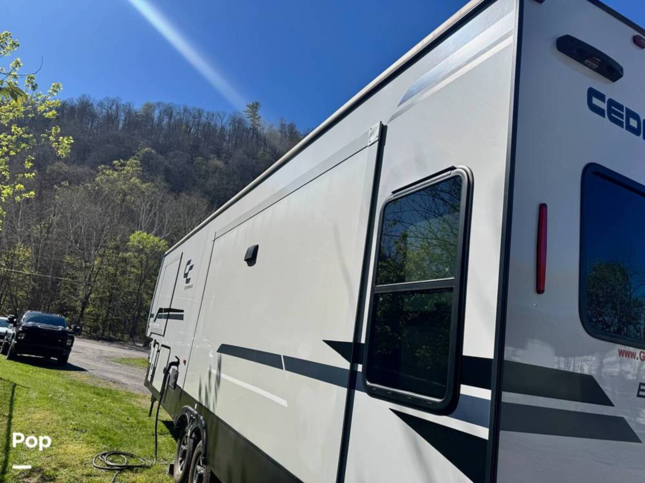 A photo of this 2023 Forest River Cedar Creek Experience 3425RL