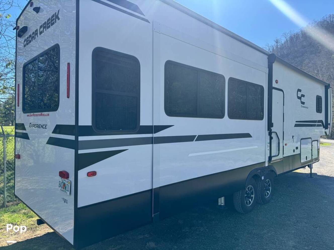 A photo of this 2023 Forest River Cedar Creek Experience 3425RL