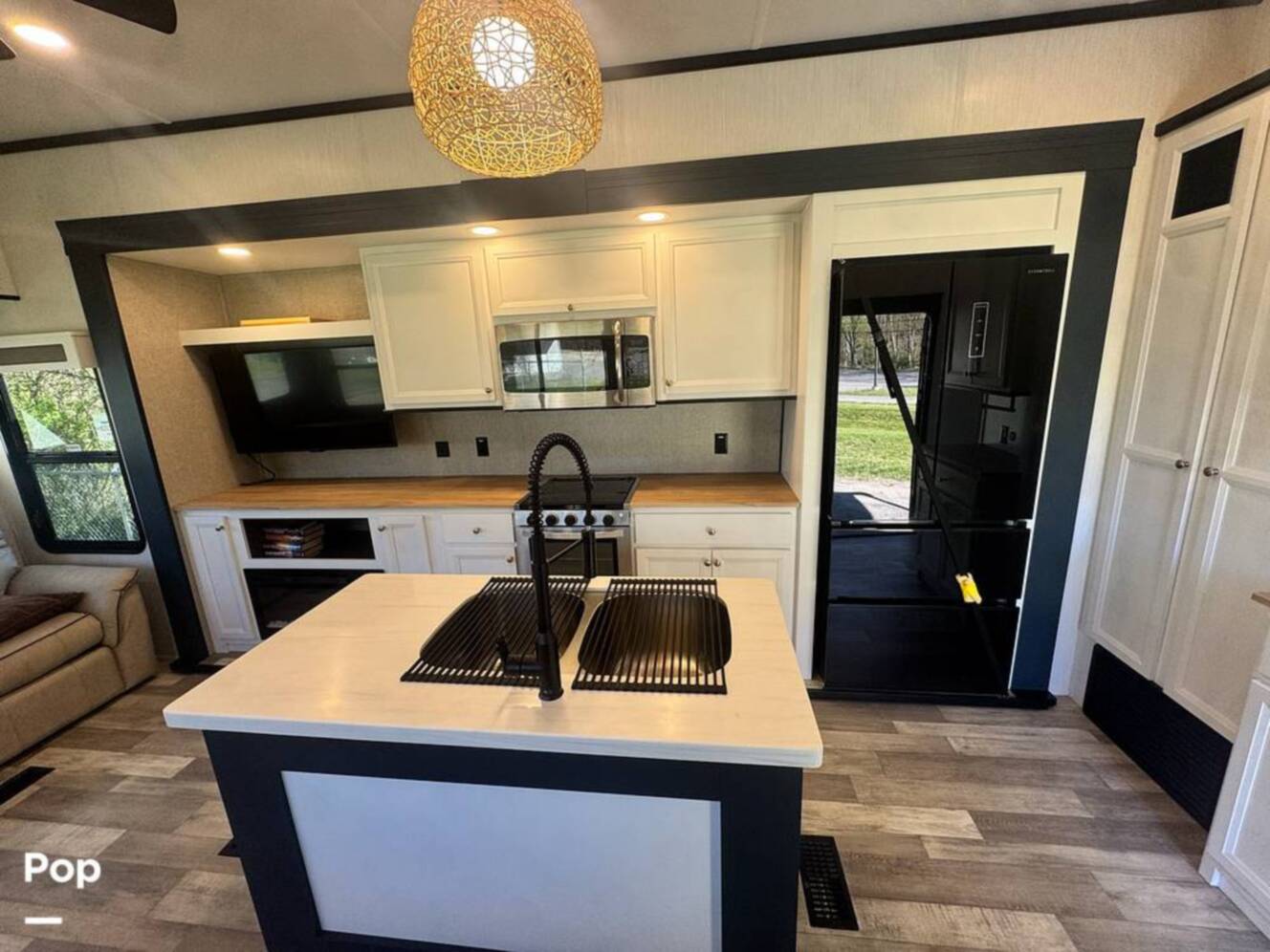 A photo of this 2023 Forest River Cedar Creek Experience 3425RL