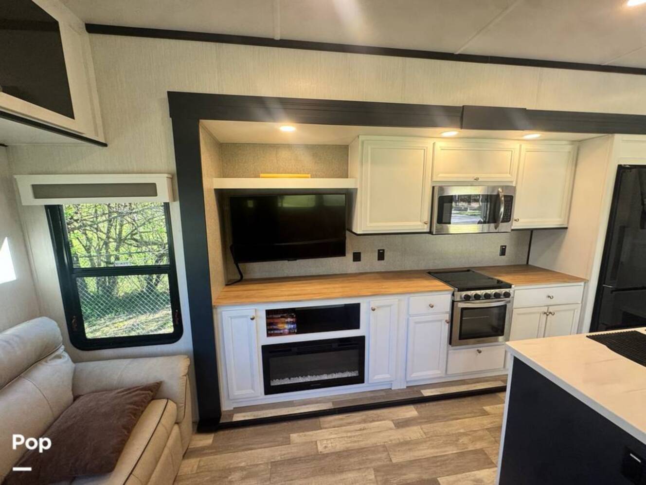 A photo of this 2023 Forest River Cedar Creek Experience 3425RL