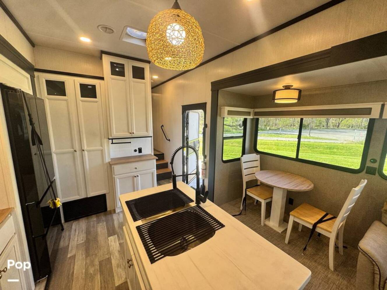 A photo of this 2023 Forest River Cedar Creek Experience 3425RL