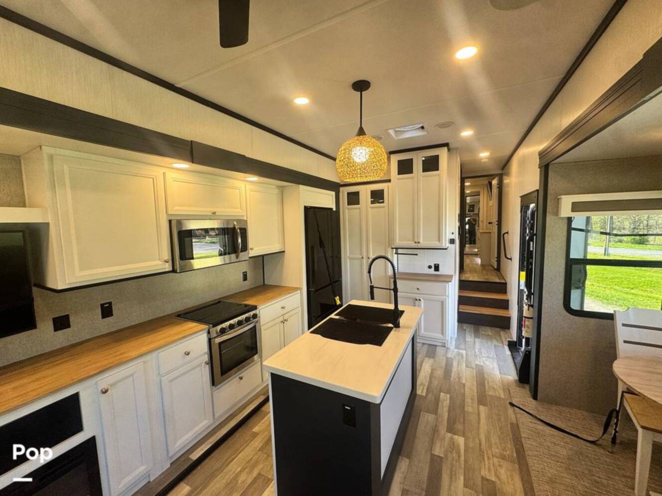 A photo of this 2023 Forest River Cedar Creek Experience 3425RL