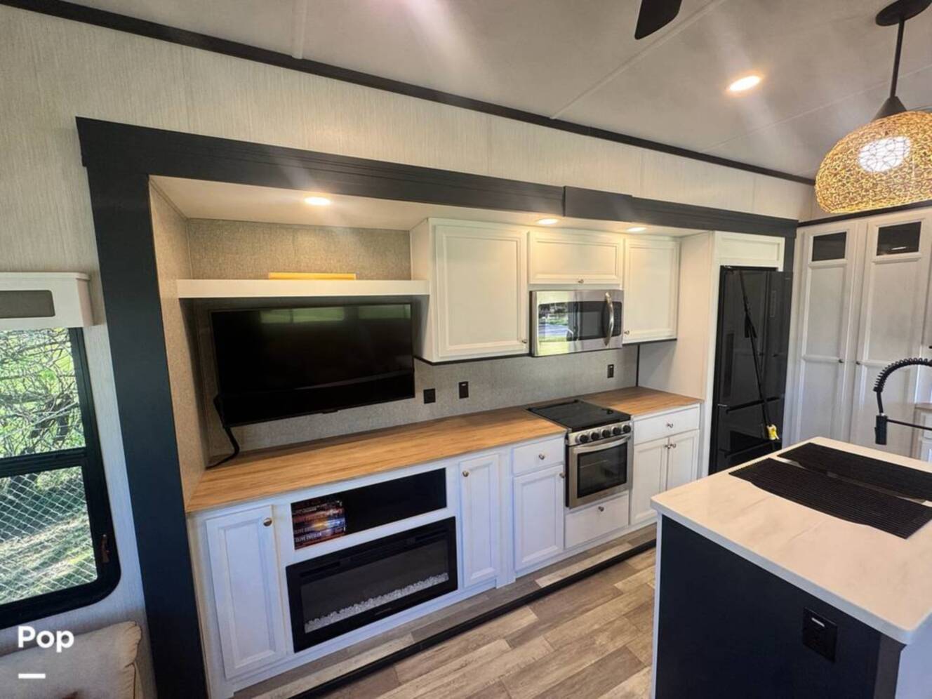 A photo of this 2023 Forest River Cedar Creek Experience 3425RL