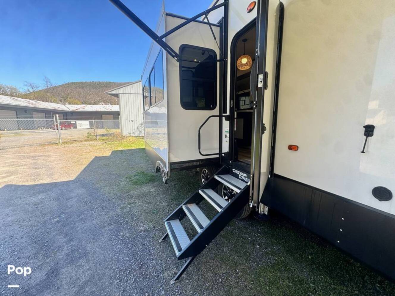 A photo of this 2023 Forest River Cedar Creek Experience 3425RL