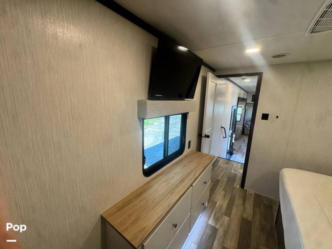 A photo of this 2023 Forest River Cedar Creek Experience 3425RL