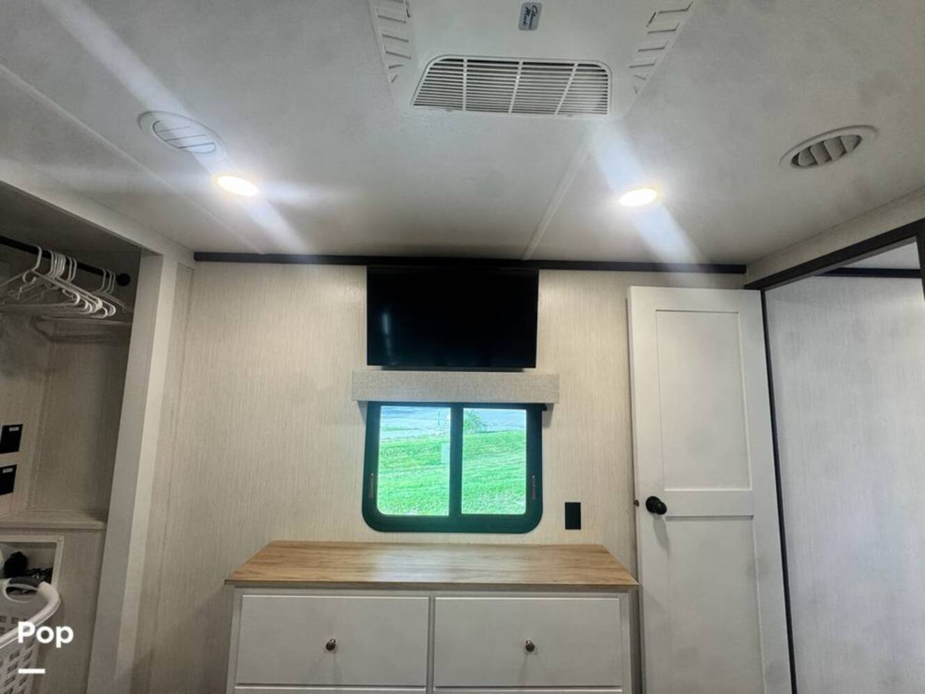 A photo of this 2023 Forest River Cedar Creek Experience 3425RL