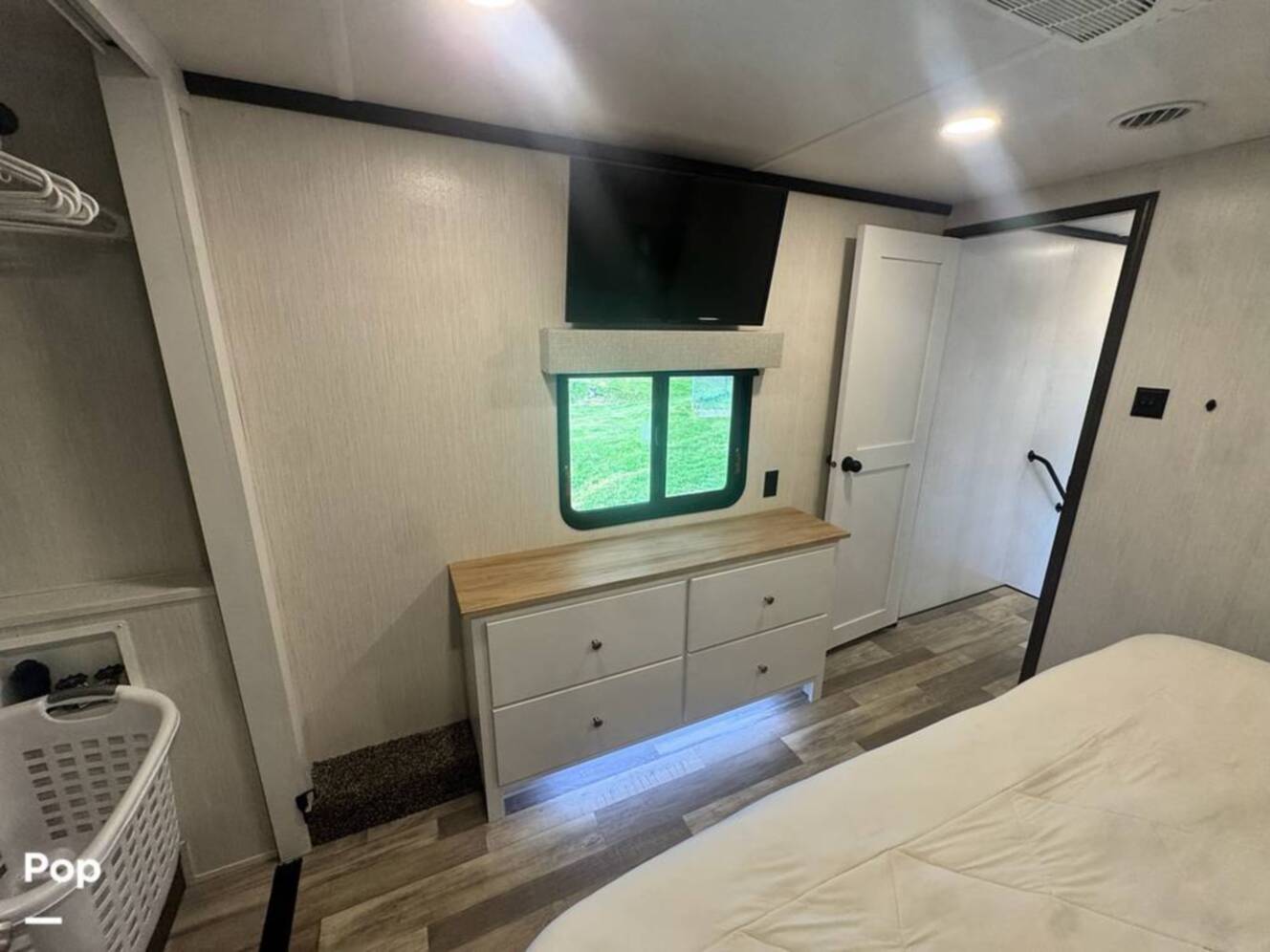 A photo of this 2023 Forest River Cedar Creek Experience 3425RL