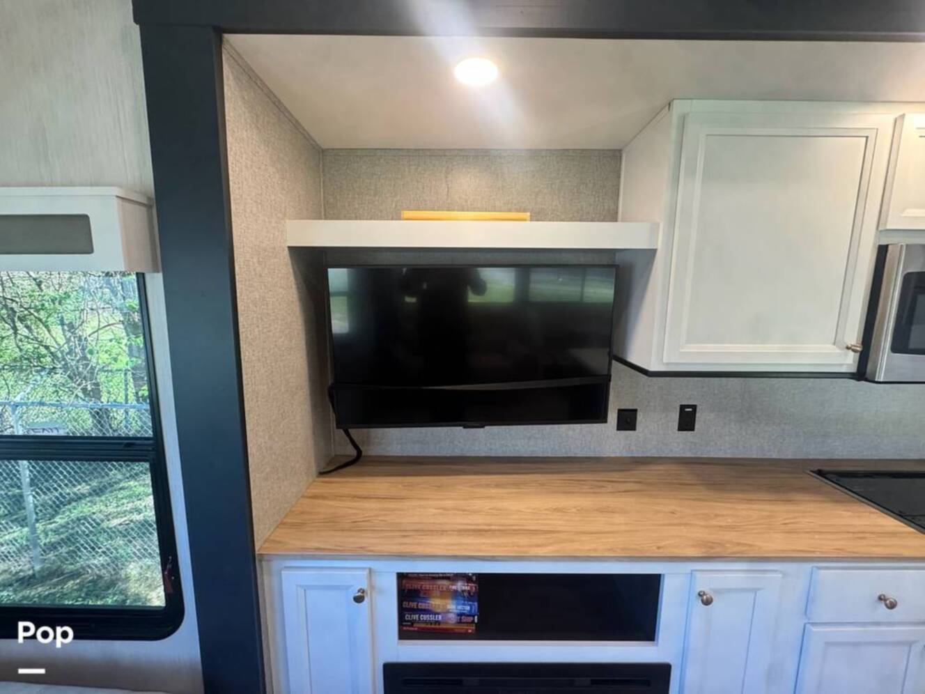 A photo of this 2023 Forest River Cedar Creek Experience 3425RL
