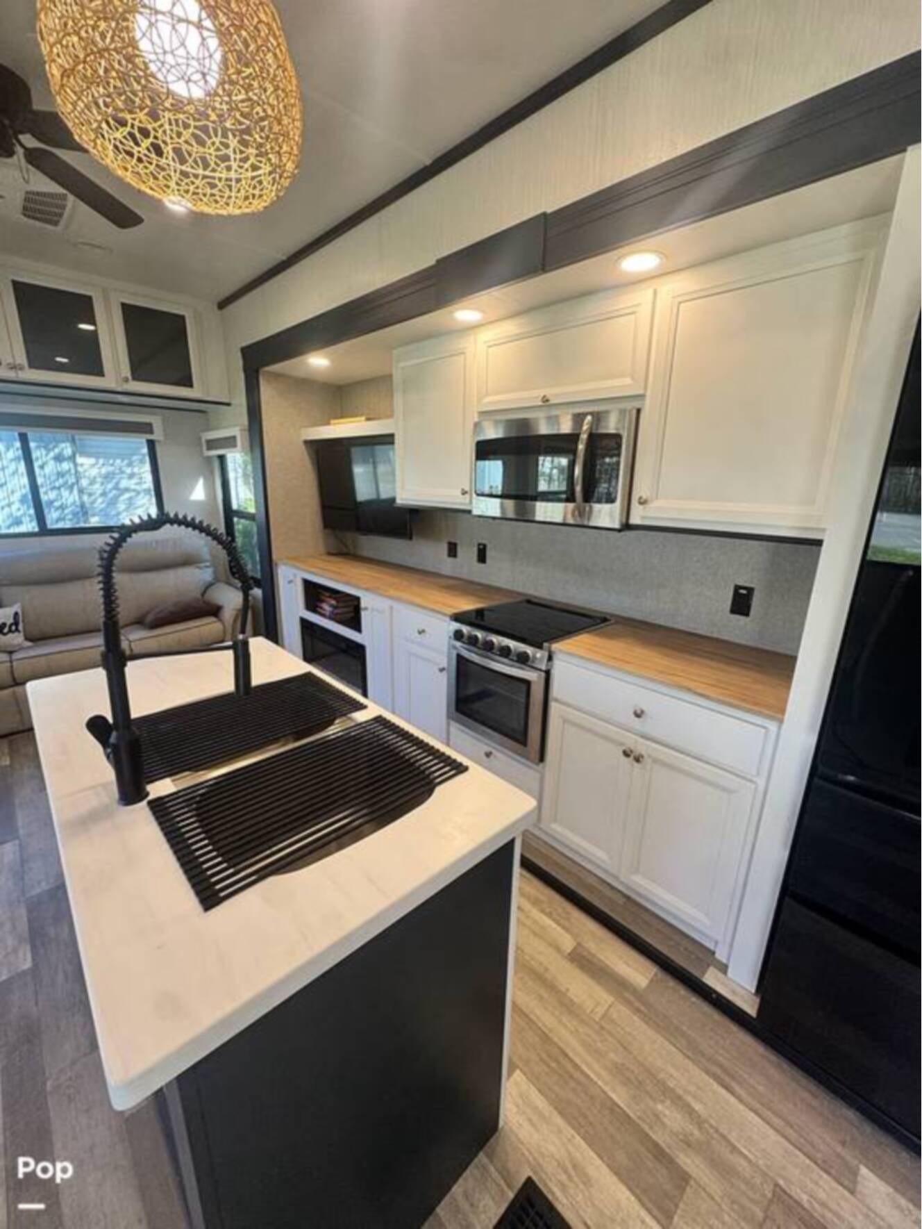 A photo of this 2023 Forest River Cedar Creek Experience 3425RL
