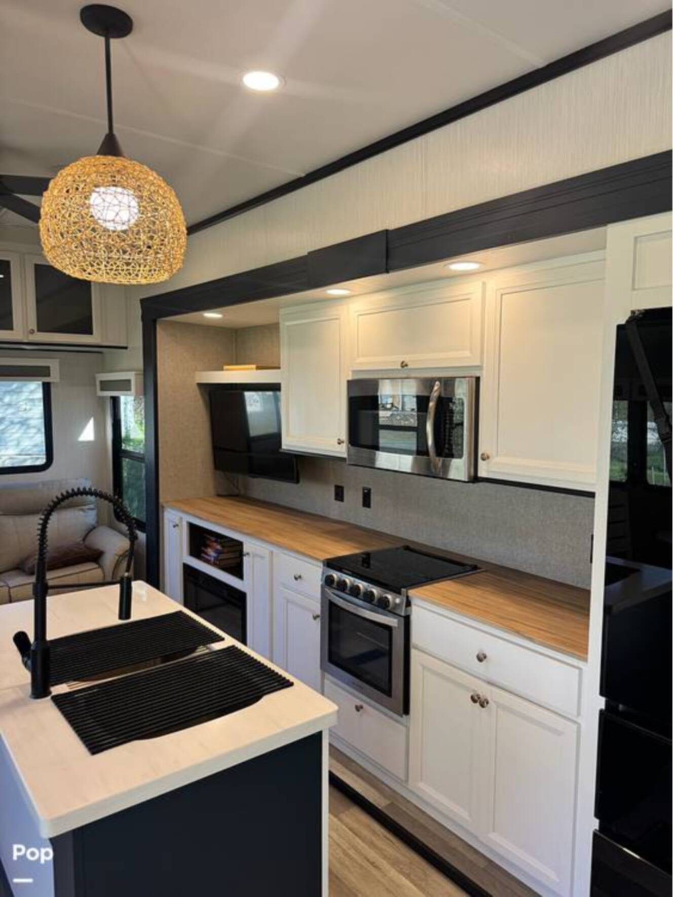 A photo of this 2023 Forest River Cedar Creek Experience 3425RL