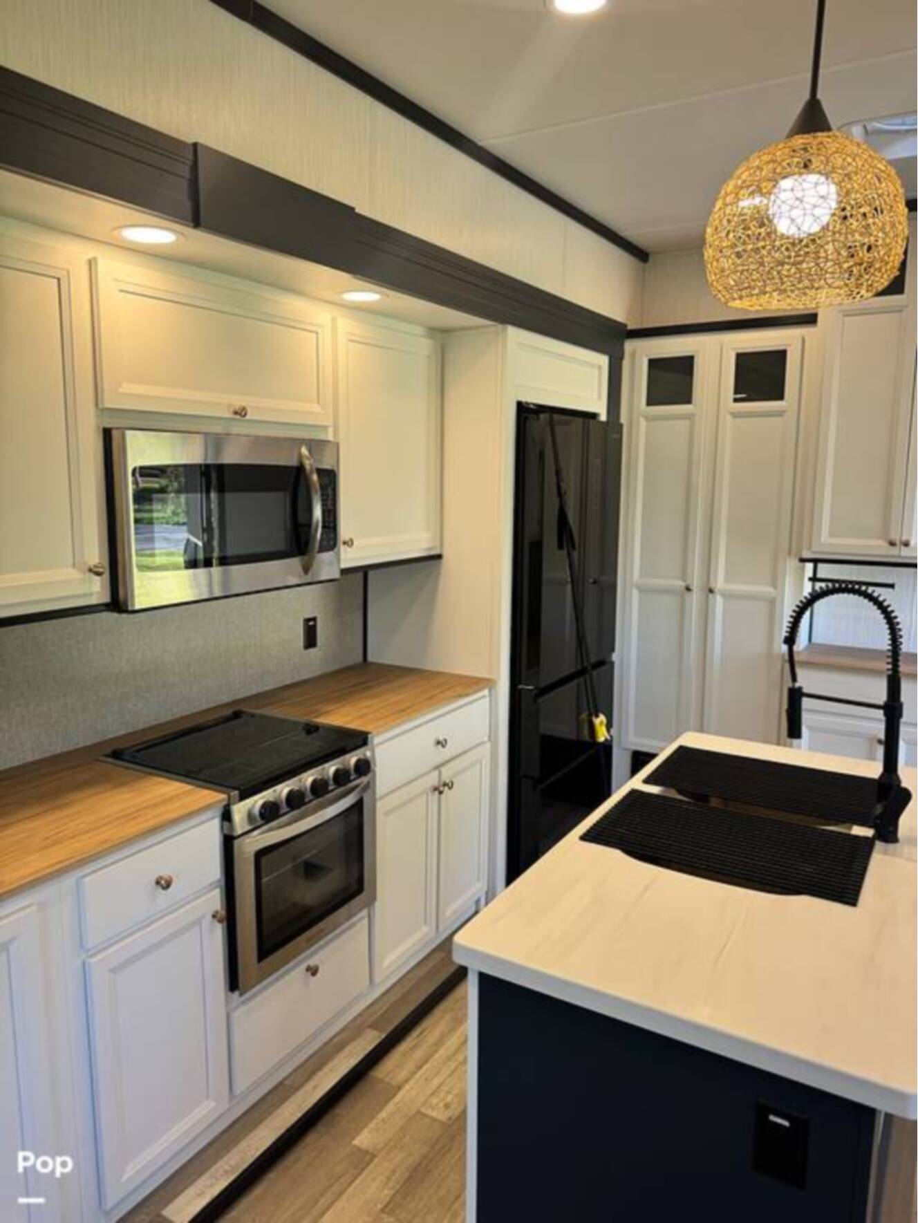 A photo of this 2023 Forest River Cedar Creek Experience 3425RL