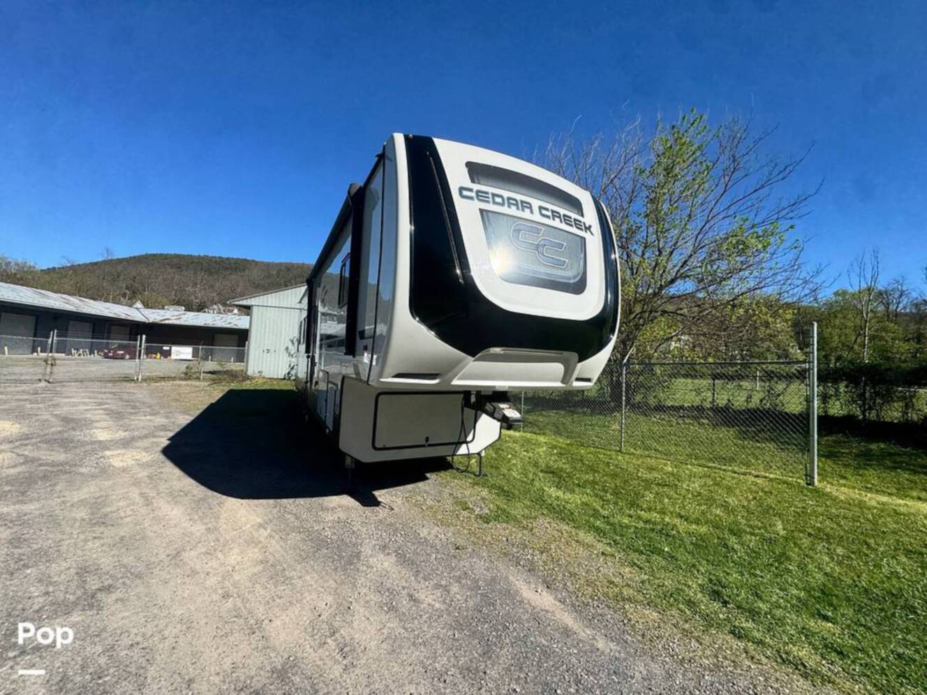 A photo of this 2023 Forest River Cedar Creek Experience 3425RL