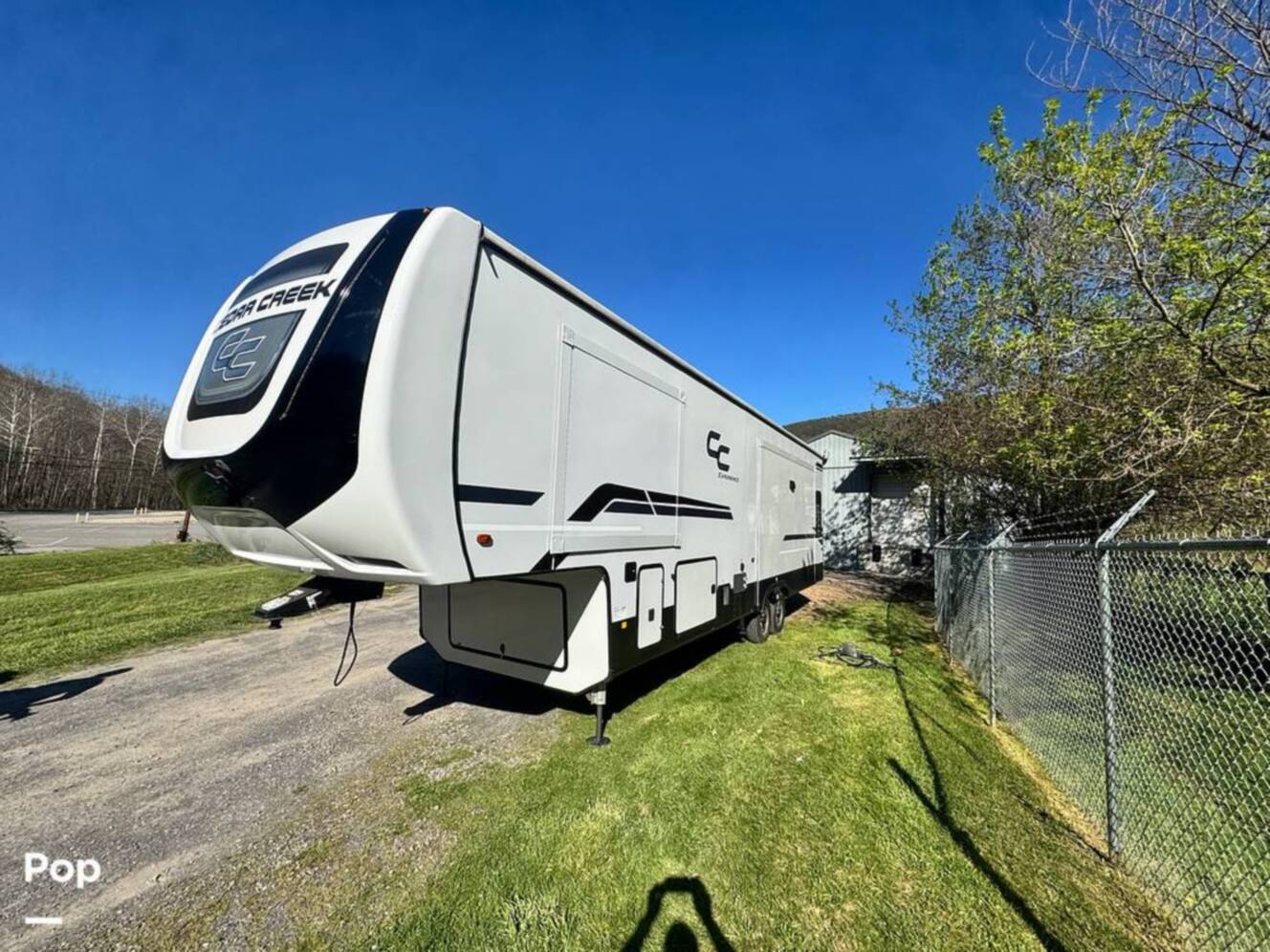 A photo of this 2023 Forest River Cedar Creek Experience 3425RL