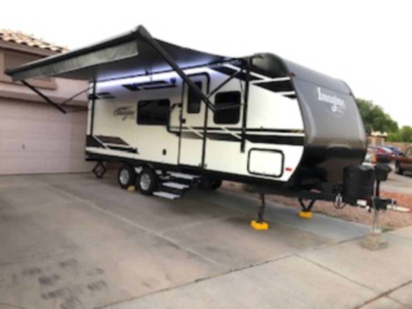 A photo of this 2021 Grand Design IMAGINE XLS 22MLE
