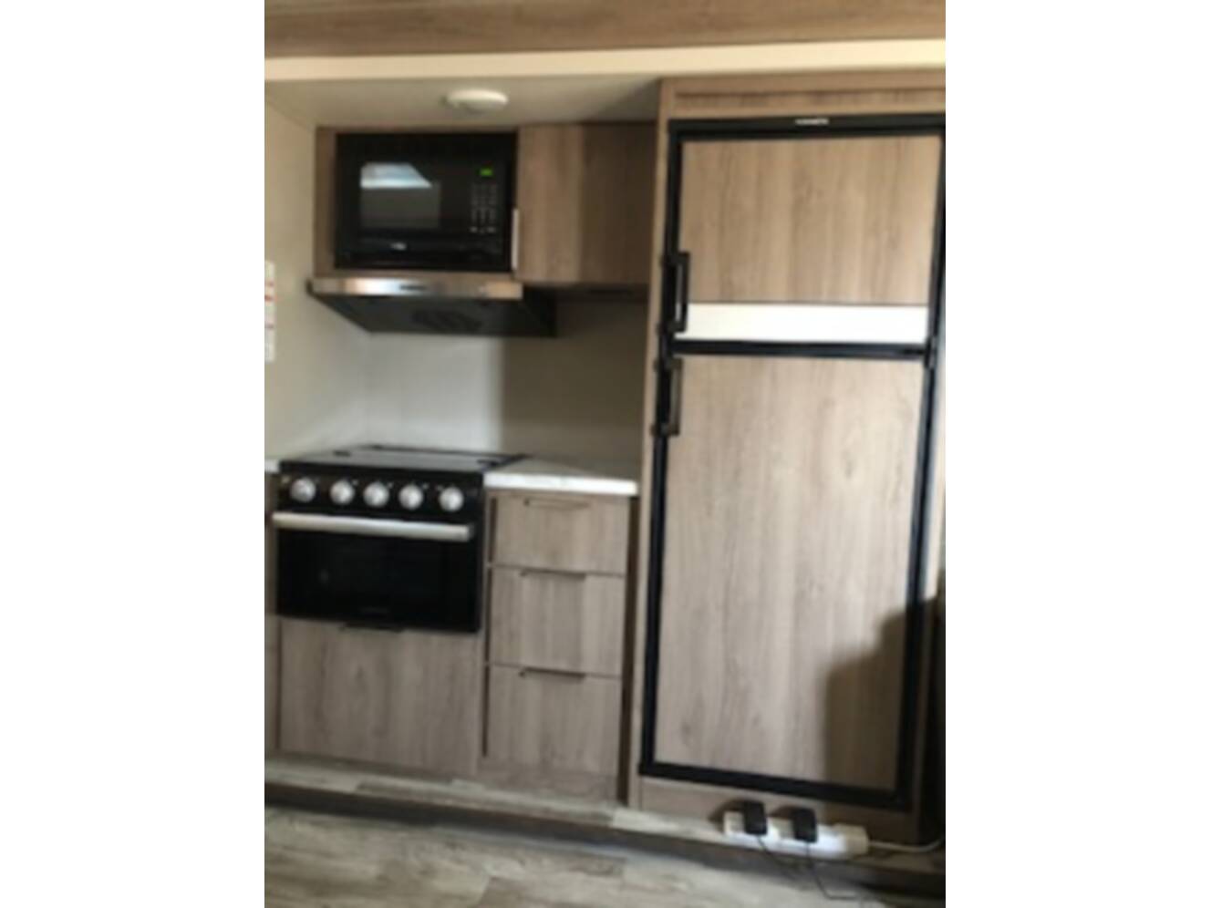 A photo of this 2021 Grand Design IMAGINE XLS 22MLE
