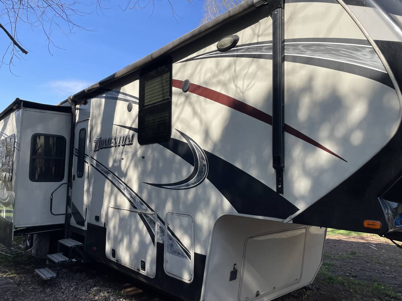A photo of this 2015 Grand Design MOMENTUM 385TH