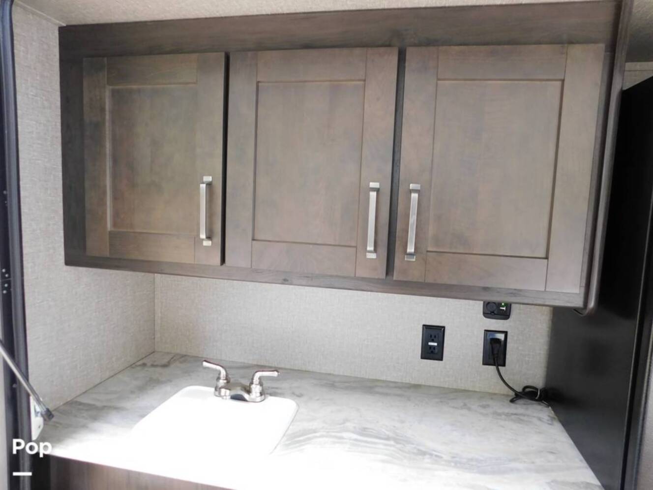 A photo of this 2021 Grand Design Reflection 312BHTS