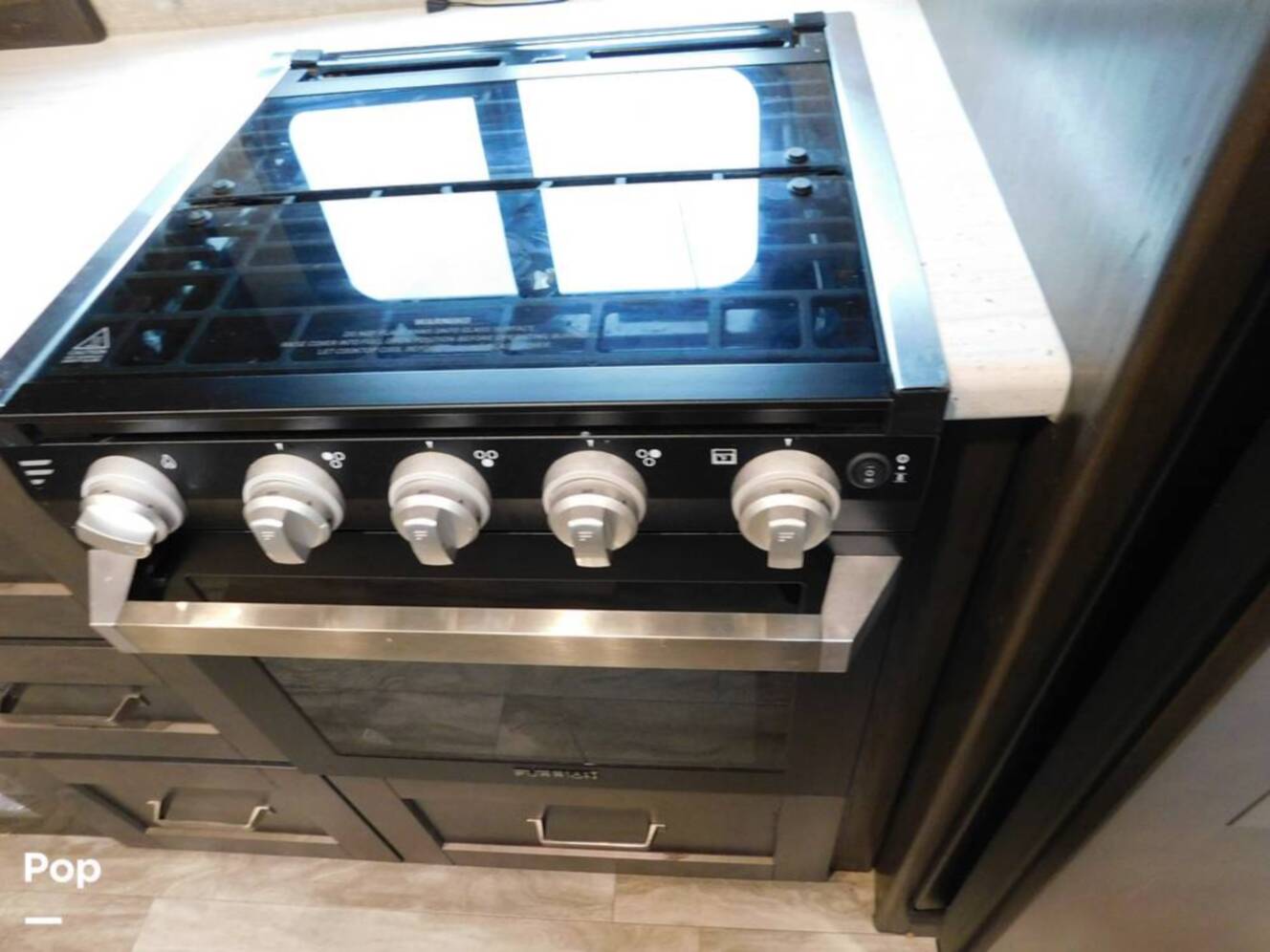 A photo of this 2021 Grand Design Reflection 312BHTS