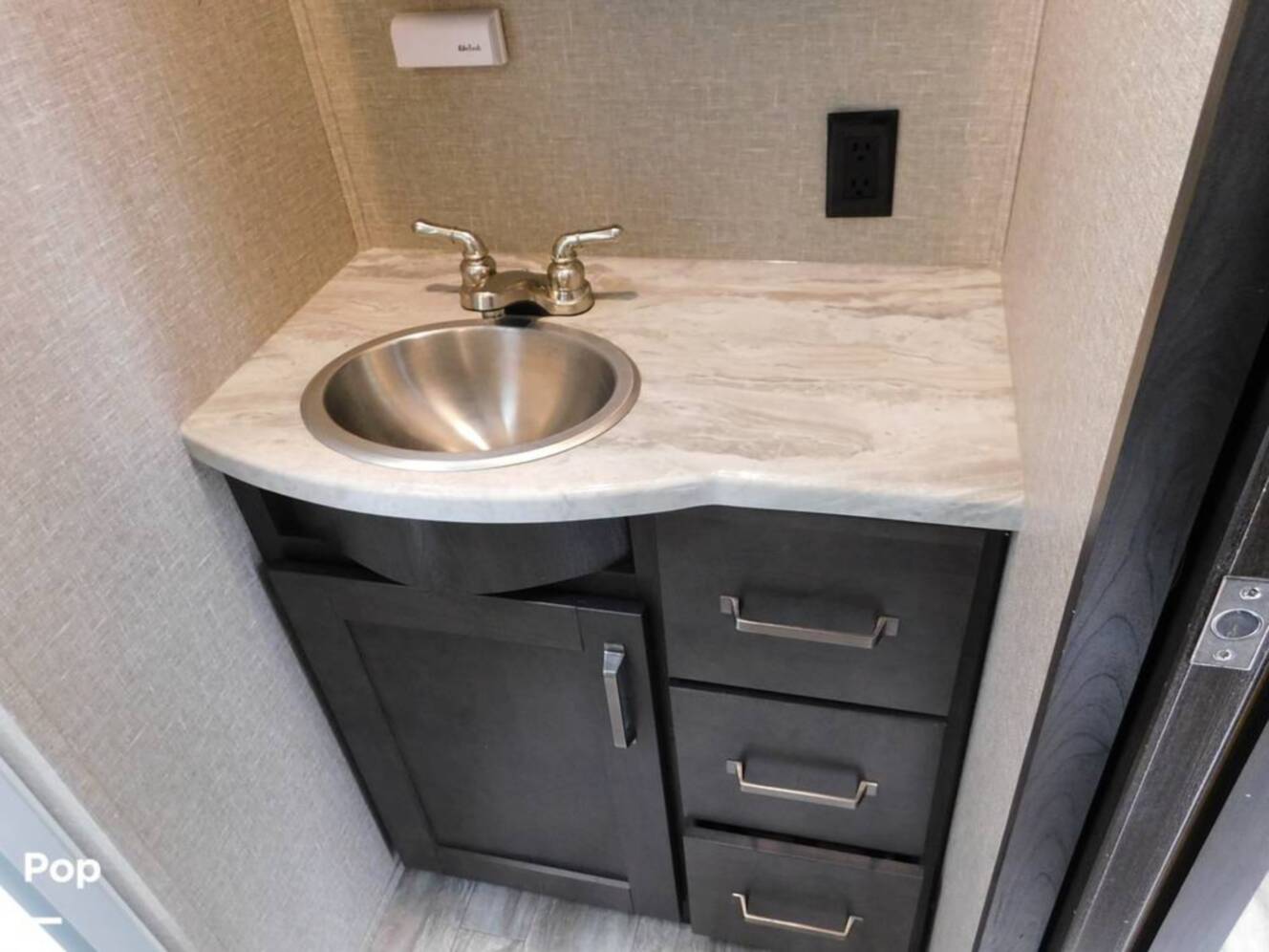 A photo of this 2021 Grand Design Reflection 312BHTS