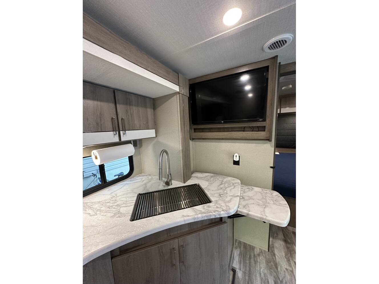 A photo of this 2022 Grand Design IMAGINE XLS 23BHE