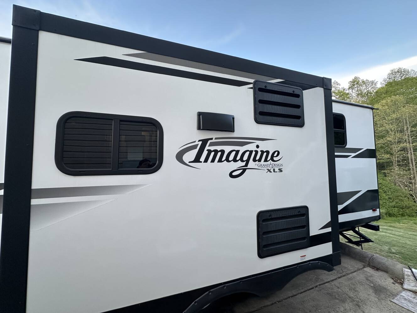 A photo of this 2022 Grand Design IMAGINE XLS 23BHE