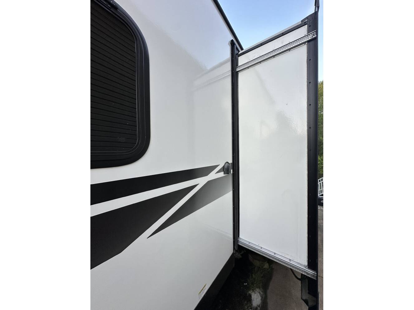 A photo of this 2022 Grand Design IMAGINE XLS 23BHE