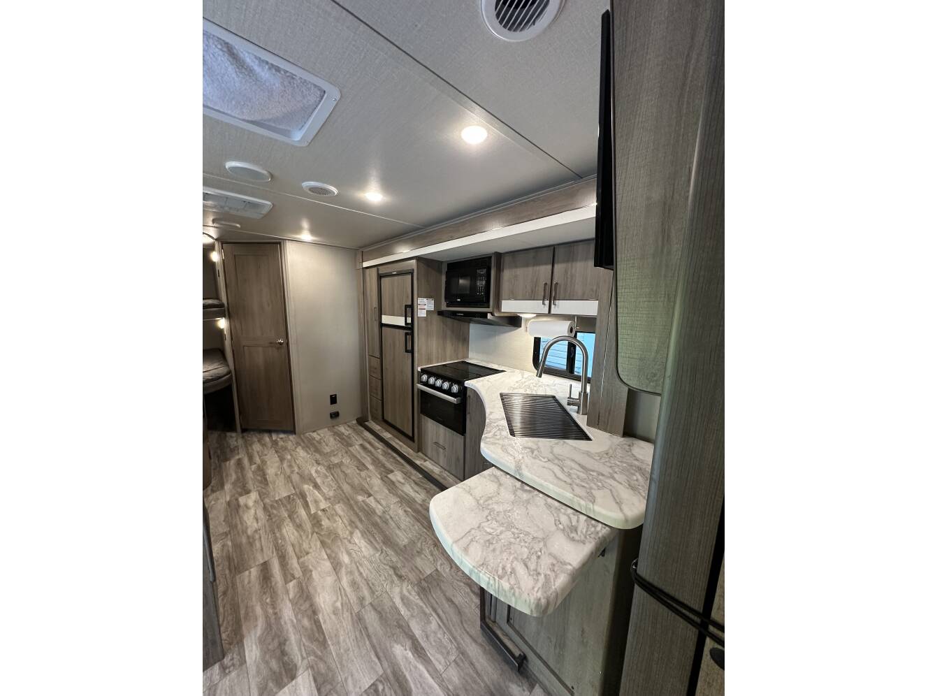 A photo of this 2022 Grand Design IMAGINE XLS 23BHE