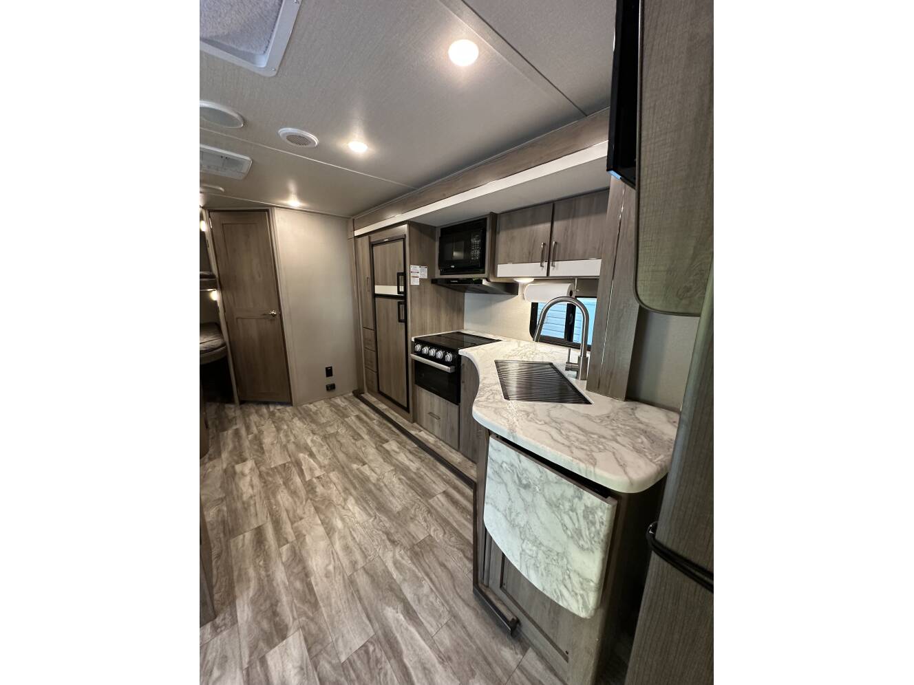 A photo of this 2022 Grand Design IMAGINE XLS 23BHE