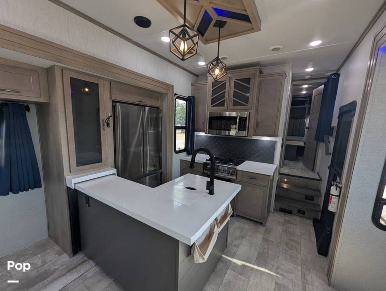 A photo of this 2023 Grand Design Momentum 395MS-R