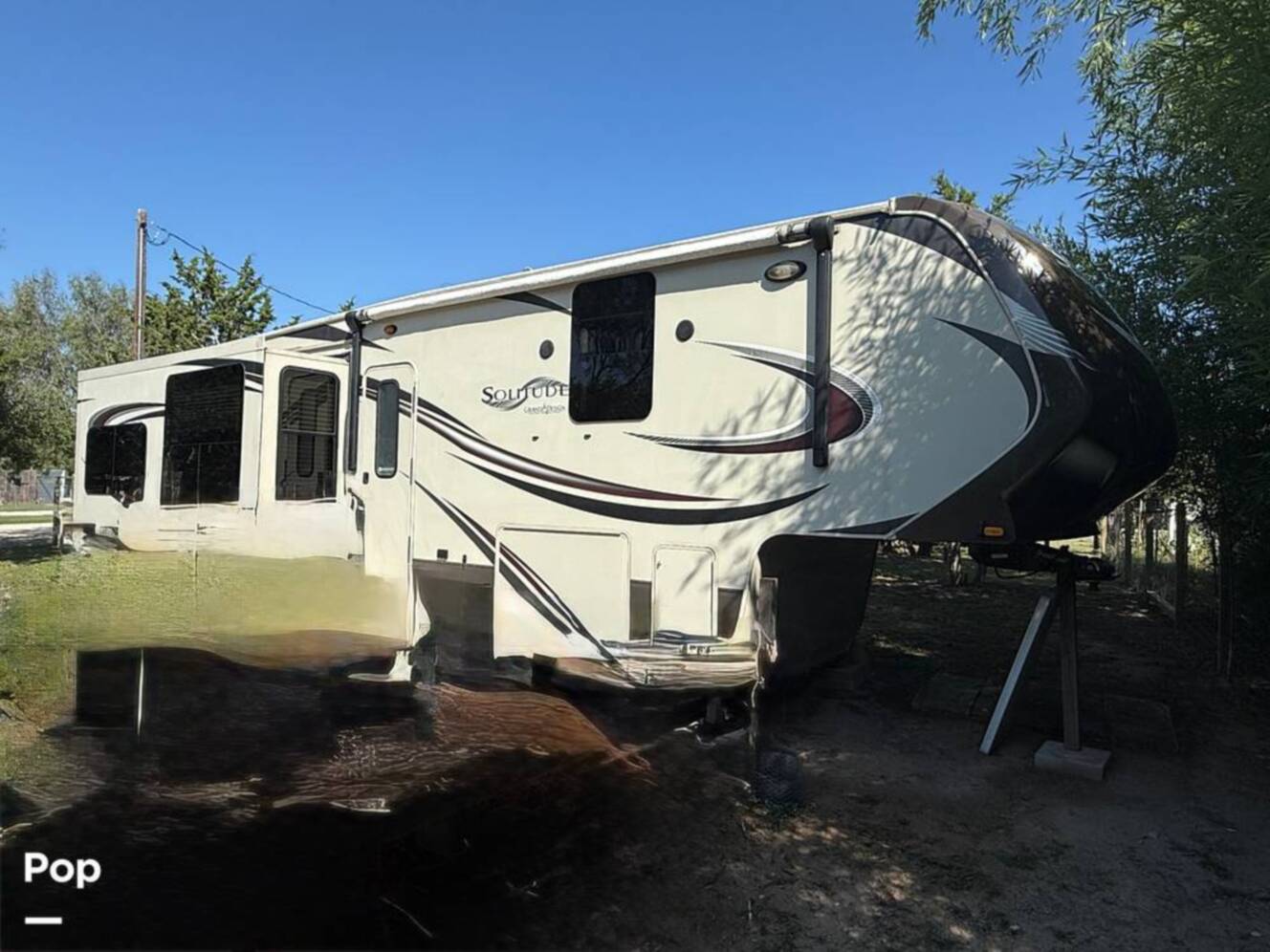 A photo of this 2015 Grand Design Solitude 369RL