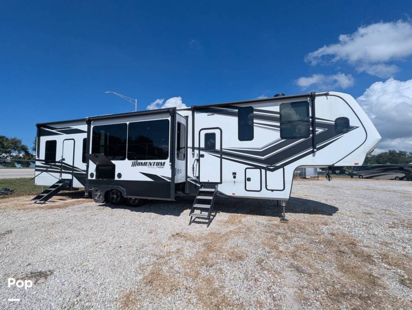A photo of this 2023 Grand Design Momentum 395MS-R