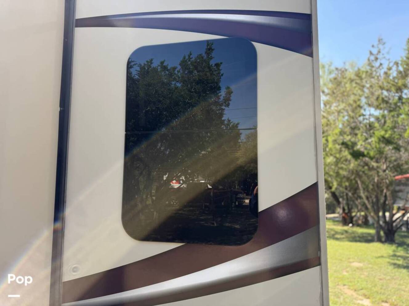 A photo of this 2015 Grand Design Solitude 369RL