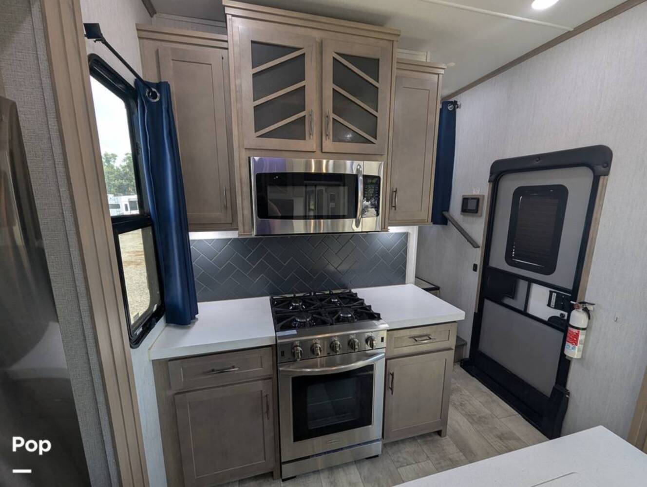 A photo of this 2023 Grand Design Momentum 395MS-R