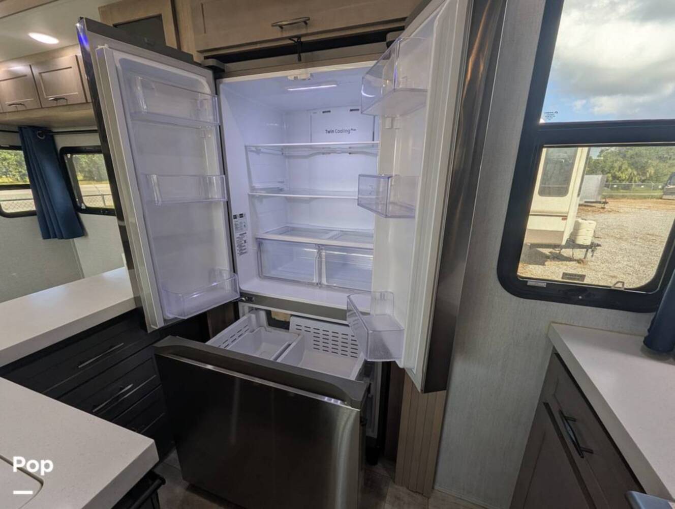 A photo of this 2023 Grand Design Momentum 395MS-R