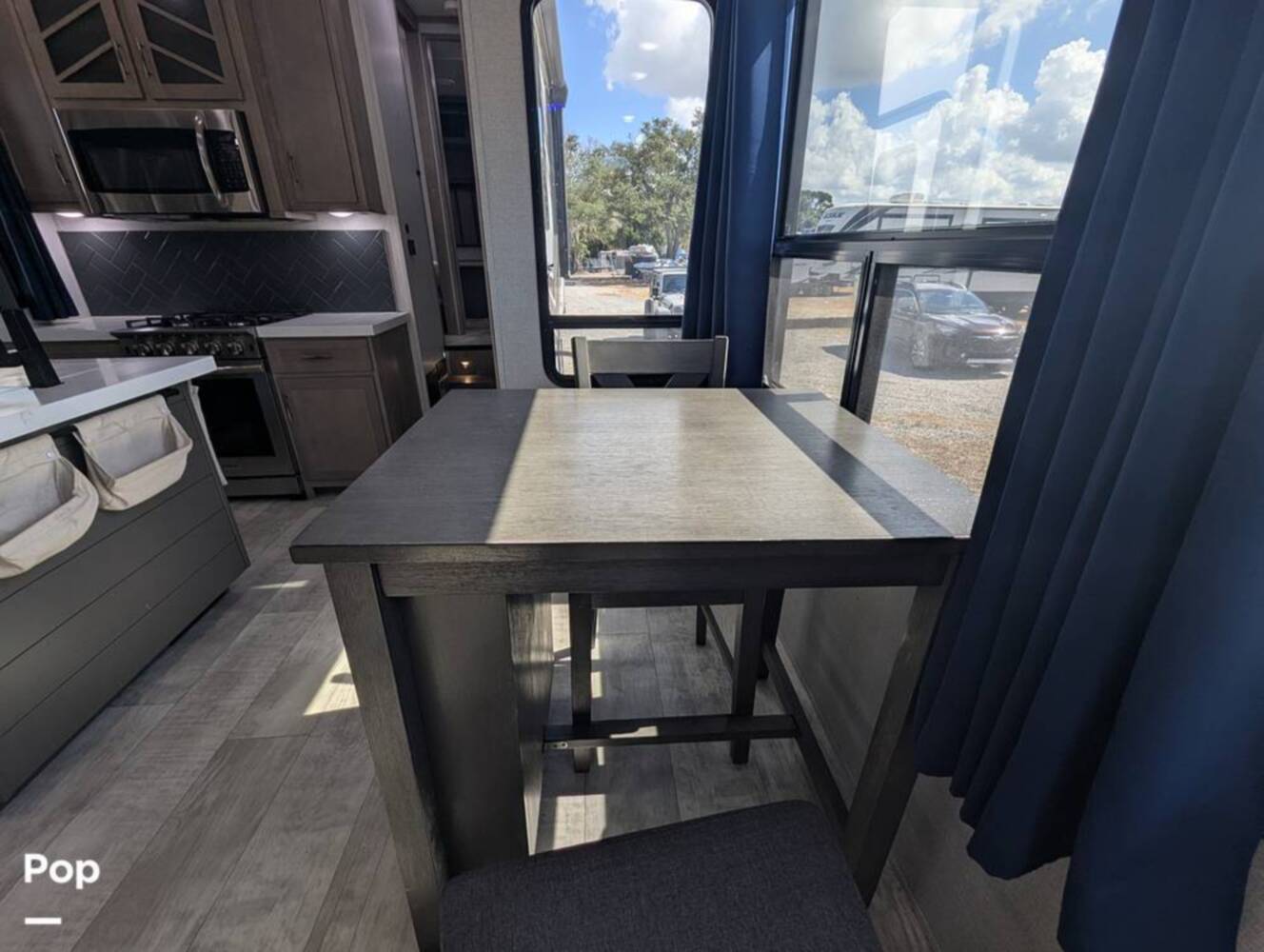 A photo of this 2023 Grand Design Momentum 395MS-R