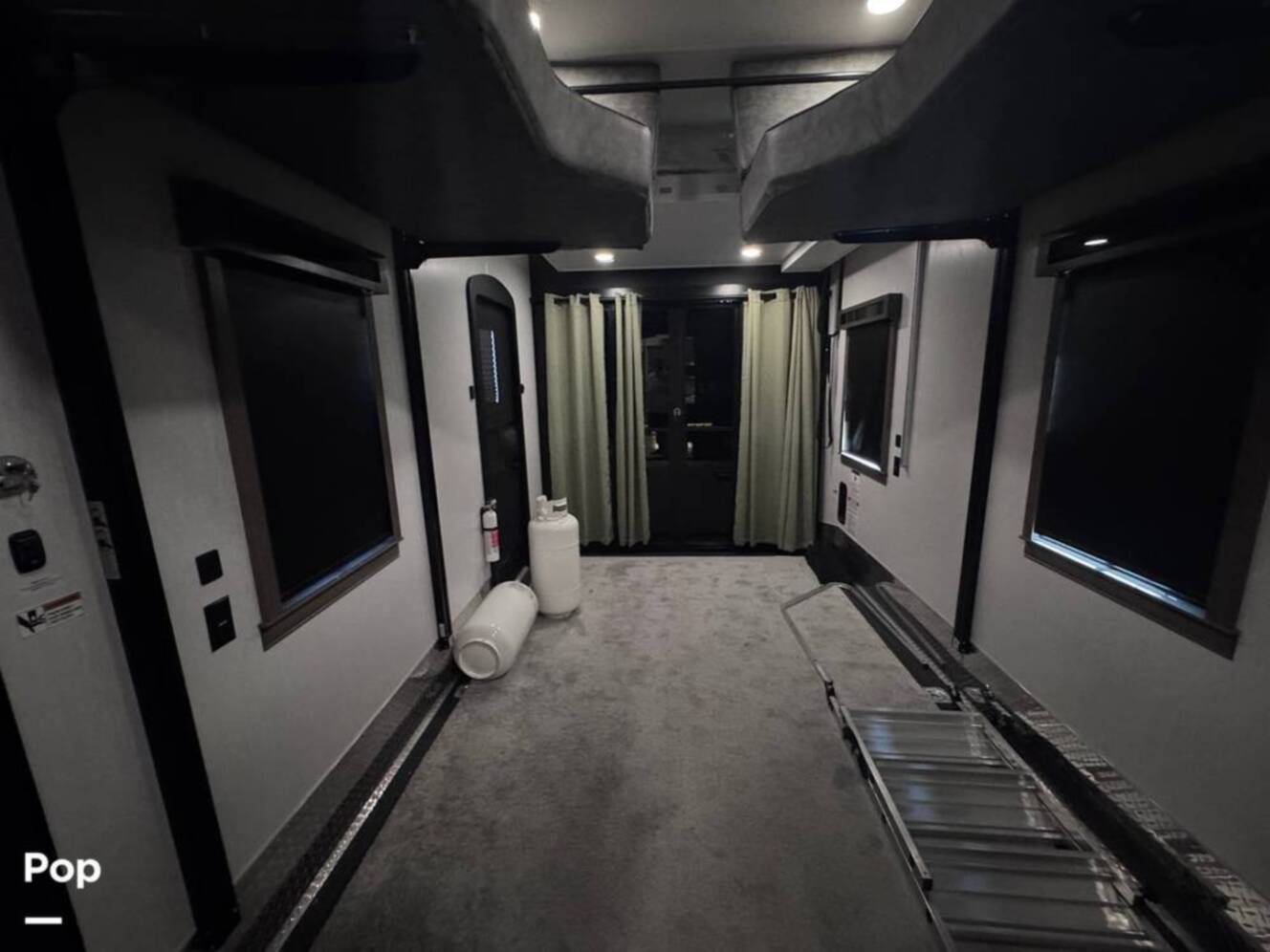 A photo of this 2023 Forest River Riverstone 45BATH Toy Hauler