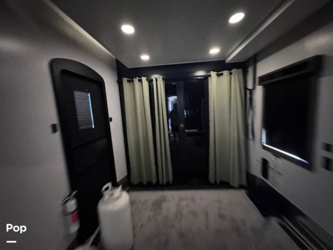 A photo of this 2023 Forest River Riverstone 45BATH Toy Hauler