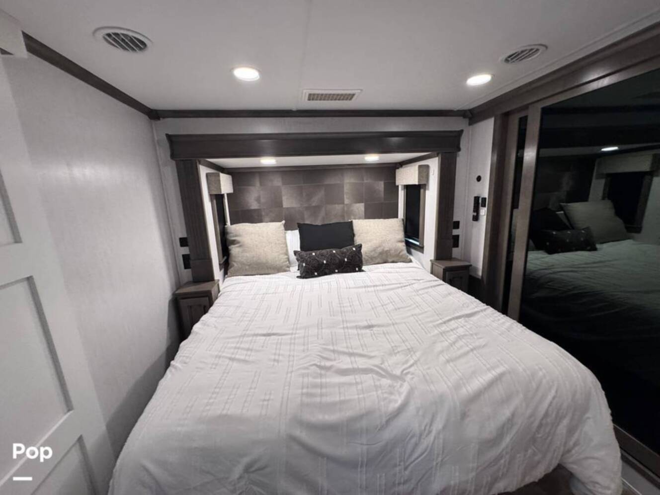 A photo of this 2023 Forest River Riverstone 45BATH Toy Hauler