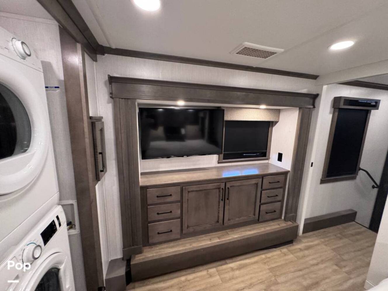A photo of this 2023 Forest River Riverstone 45BATH Toy Hauler