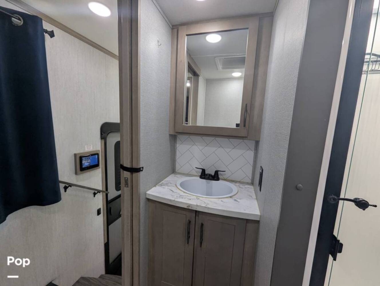 A photo of this 2023 Grand Design Momentum 395MS-R