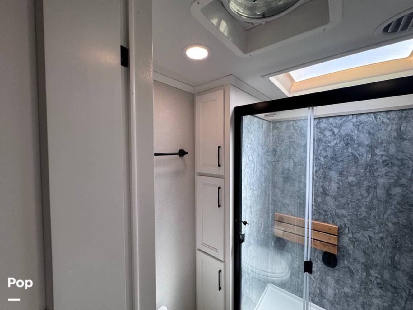 A photo of this 2023 Forest River Riverstone 45BATH Toy Hauler