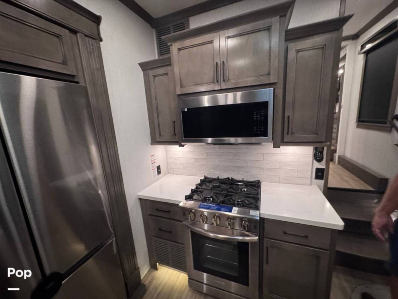 A photo of this 2023 Forest River Riverstone 45BATH Toy Hauler