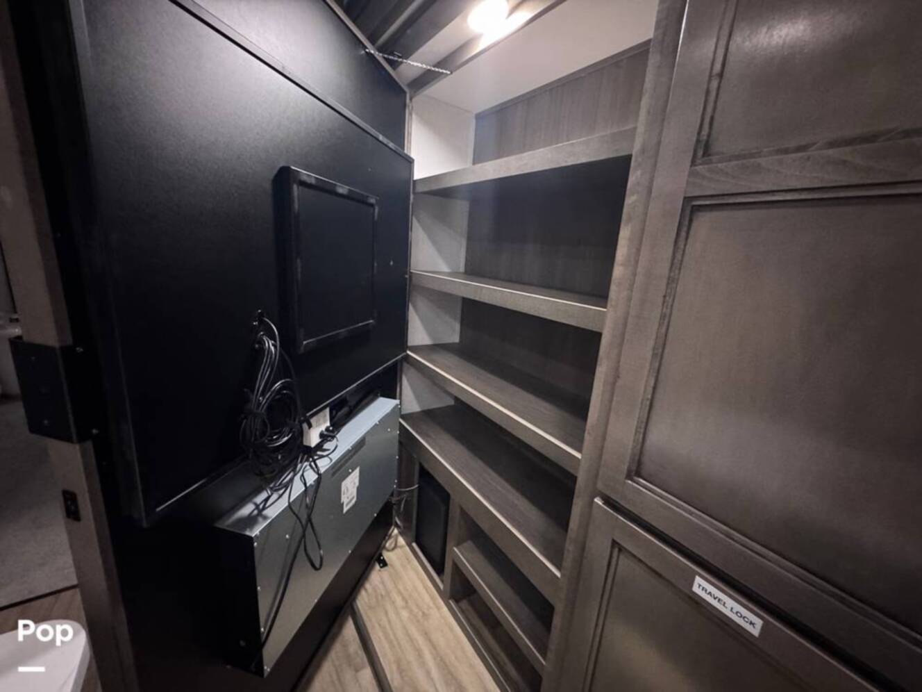 A photo of this 2023 Forest River Riverstone 45BATH Toy Hauler