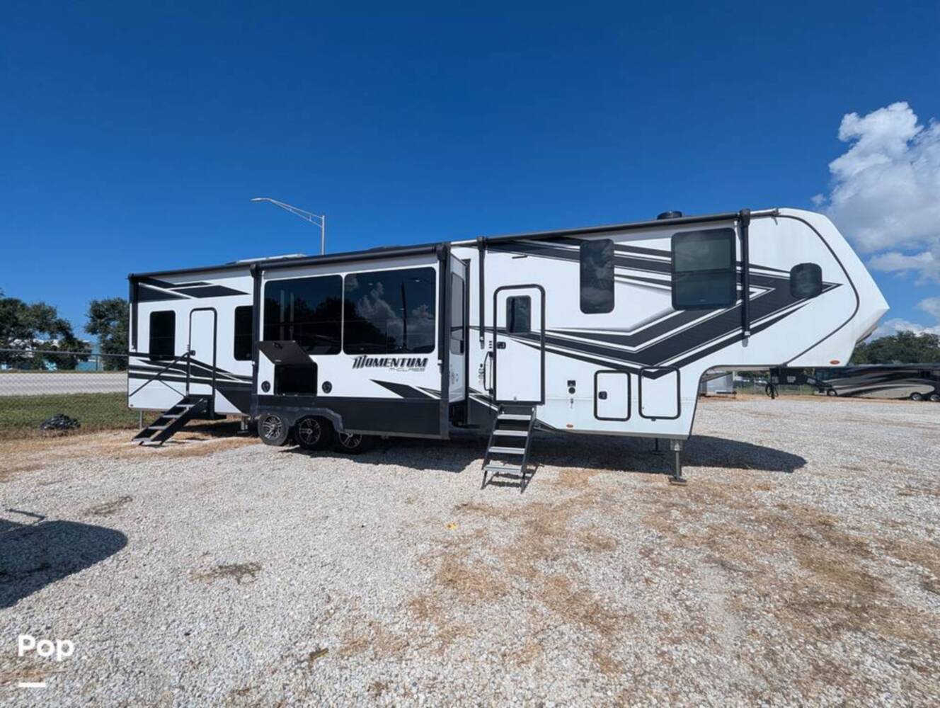 A photo of this 2023 Grand Design Momentum 395MS-R