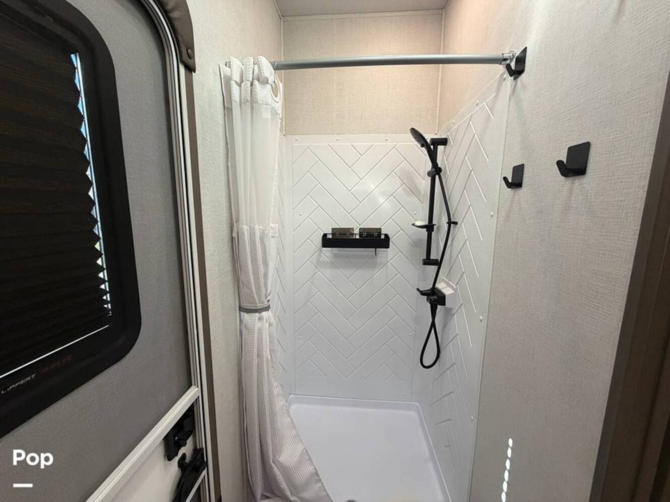A photo of this 2023 Grand Design Solitude 391DL