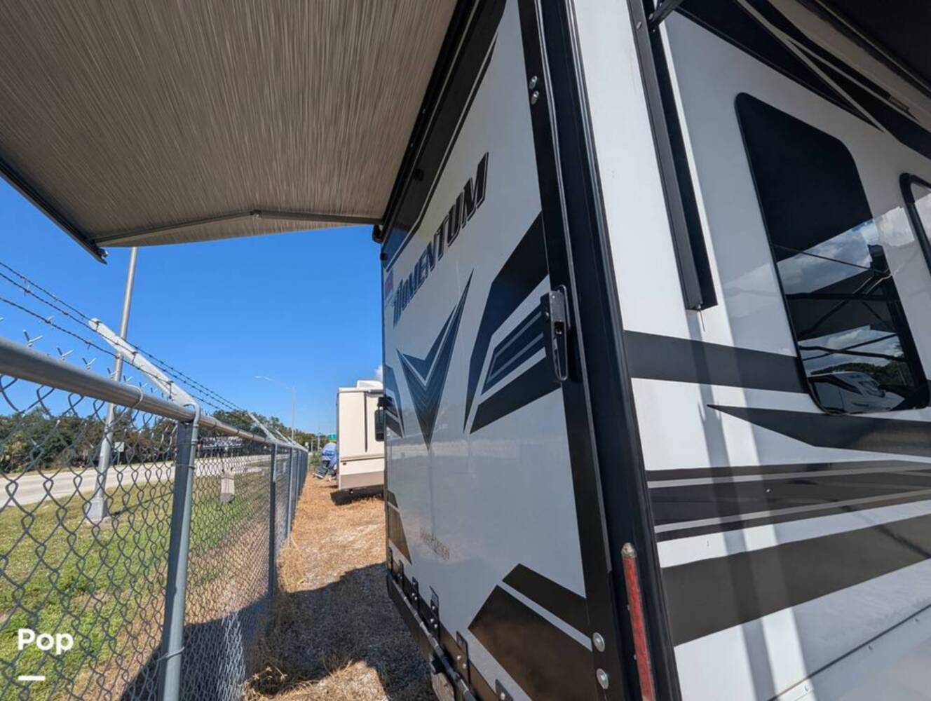 A photo of this 2023 Grand Design Momentum 395MS-R