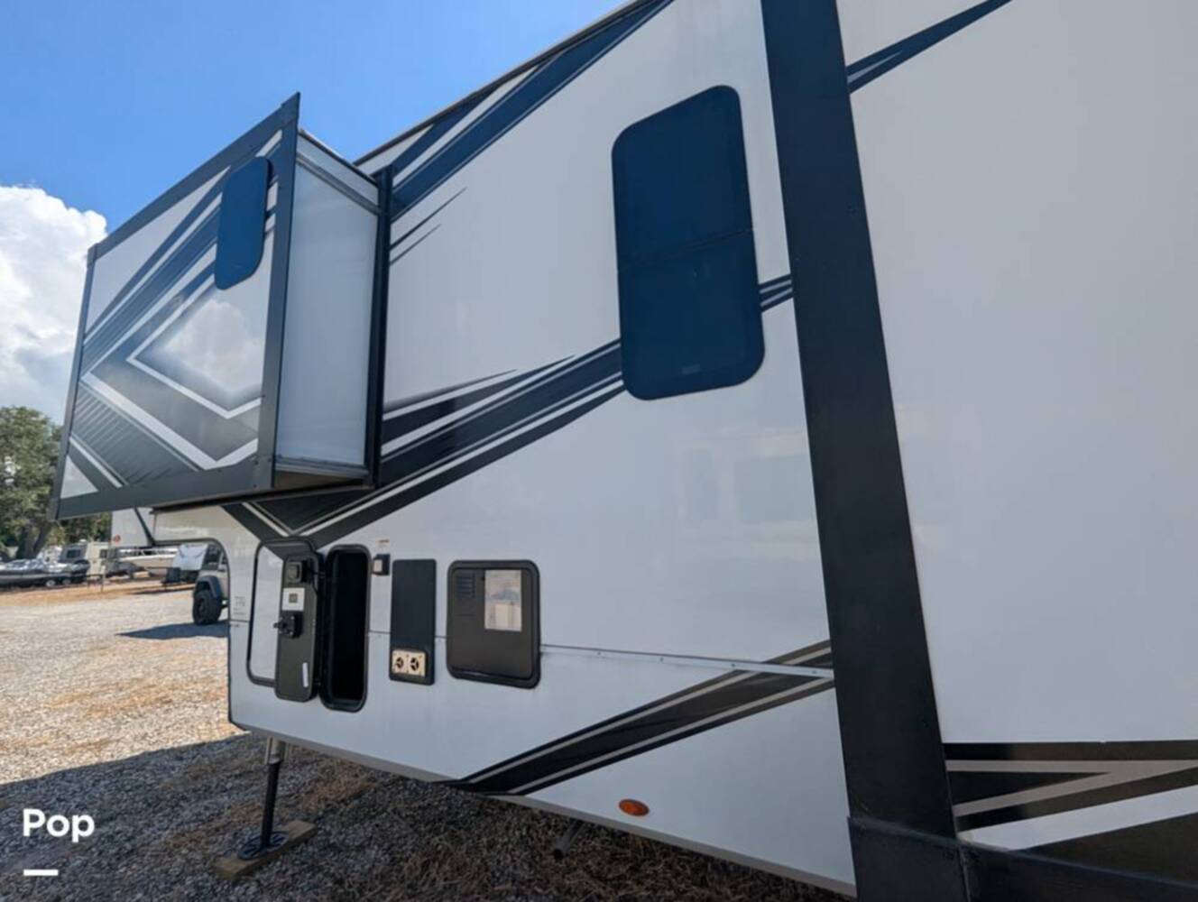 A photo of this 2023 Grand Design Momentum 395MS-R